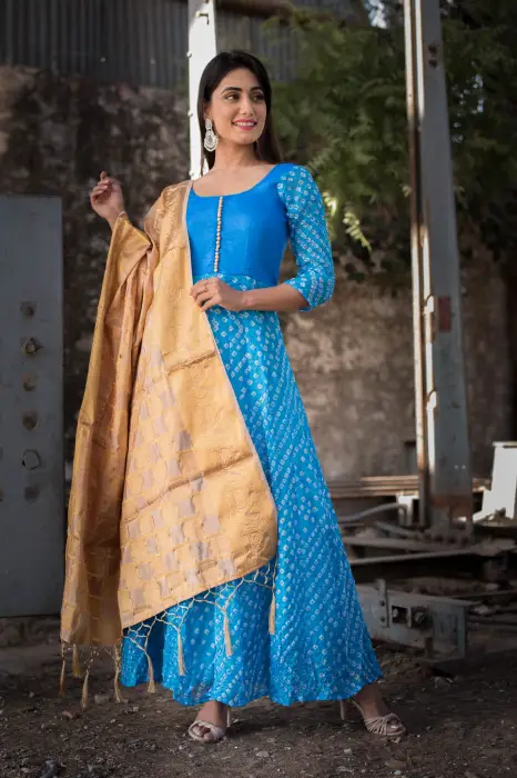 blue bandhani anarkali with golden dupatta